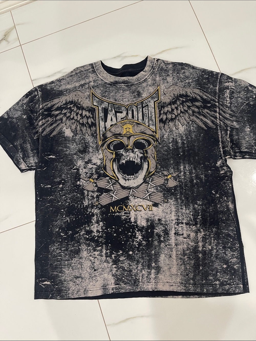 Vintage Tapout Black and Gold Skull Warrior Graphic Tee